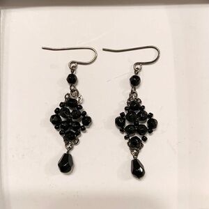 Black beaded earrings.